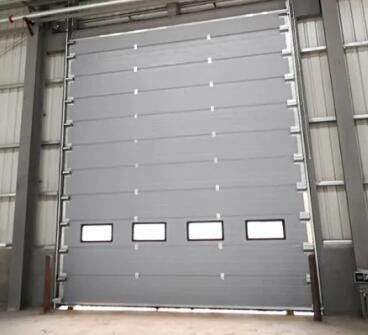 Las puertas seccionales aisladas industriales dividen para el panel de arriba de la casa 40m m