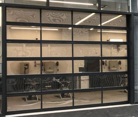 Puerta seccional de aluminio comercial con paneles de vidrio y control remoto de recubrimiento en polvo