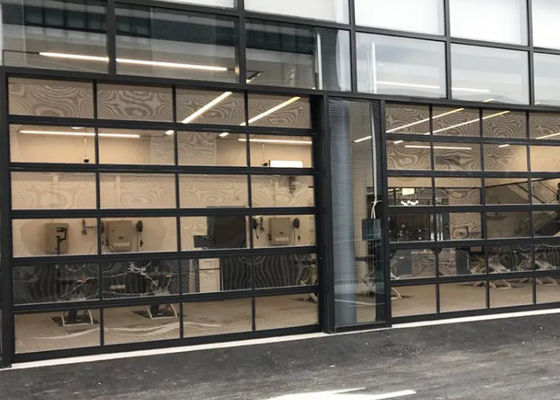Puerta seccional de aluminio comercial con paneles de vidrio y control remoto de recubrimiento en polvo