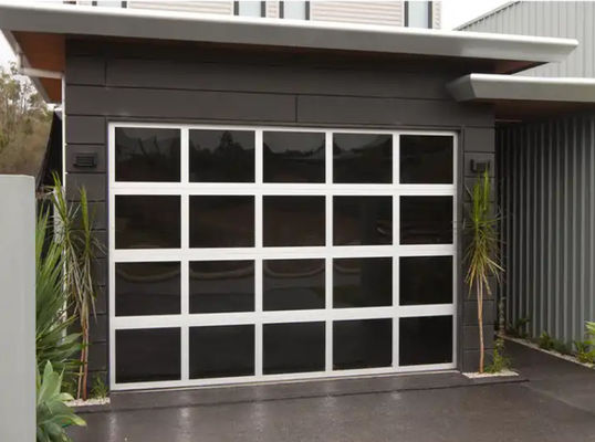 Puerta seccional de aluminio negro con excelente aislamiento y vidrio de doble acristalamiento automático de aluminio negro con vidrio glaseado