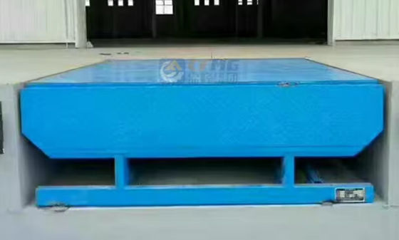 Nivelador de muelle de carga de seguridad personalizable con controles de botones de empuje y barreras de seguridad