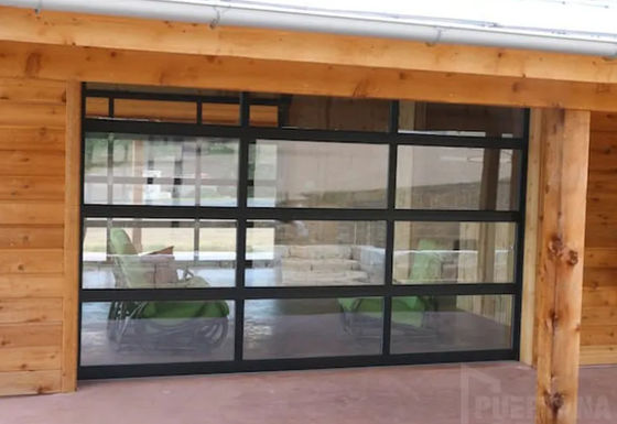 Puerta seccional de aleación de aluminio insonorizada con vidrio de doble acristalamiento y superficie de recubrimiento en polvo