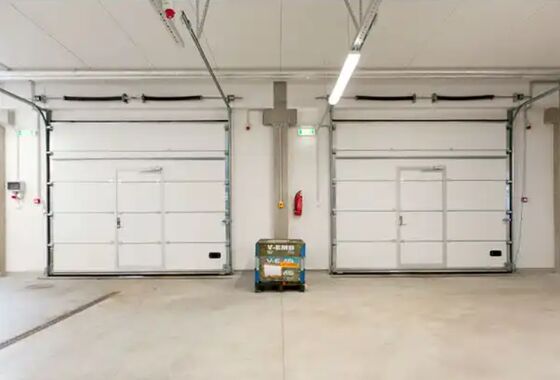 Puertas Seccionales Industriales de Acero Personalizadas para Estaciones de Bomberos Comerciales de Almacenes Automáticos en Fábricas de China