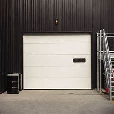 Puertas seccionales aisladas de la división del garaje para el panel de la puerta de los gastos comerciales del chalet