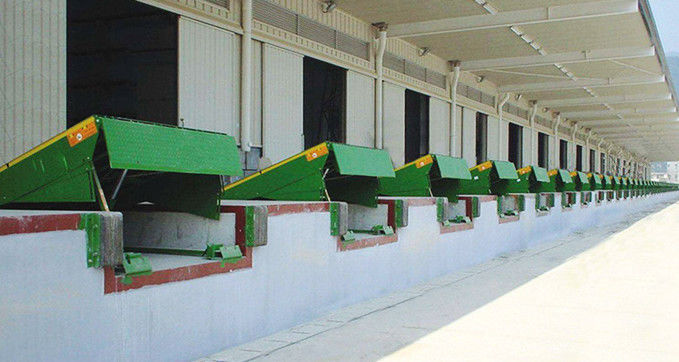 15 000 libras Nivelador eléctrico de embarque con cadenas de seguridad / Instalación en el sitio Nivelador de embarque barato al por mayor 6 toneladas