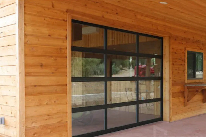 Puerta seccional de aluminio de doble acristalamiento moderna con apertura manual o automática Puertas de garaje de vidrio