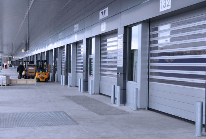 Potencia del motor de la puerta espiral de alta velocidad de aleación de aluminio 0.75KW Eficiencia de seguridad ≤2.0m3/ M2.s Velocidad de cierre 0.8m/s