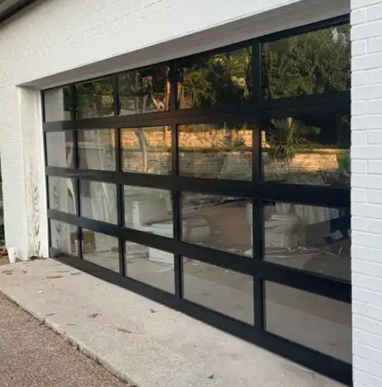 Puerta de garaje seccional de alta seguridad de aleación de aluminio de vidrio estanqueidad al agua clase 3 transparente